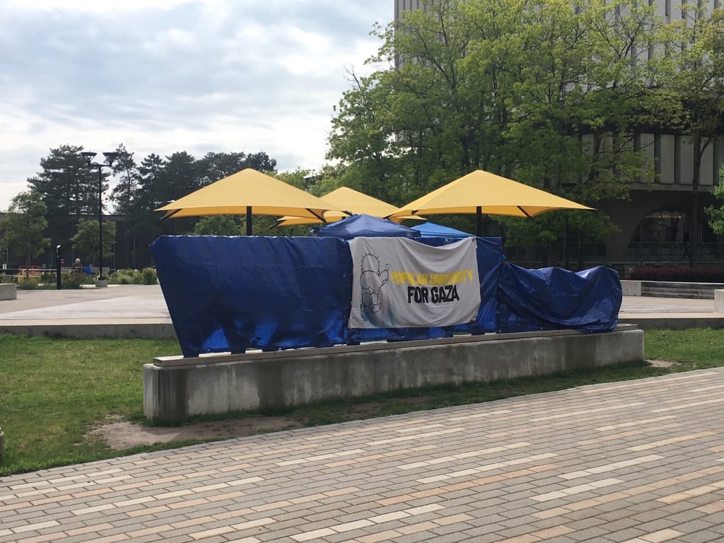 UW Sign covered in solidarity with the people of Gaza